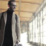 Business Trip - Man in Brown Robe Carrying Bag Smiling