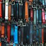 Belts - Shallow Focus Photography of Assorted-color Leather Belts