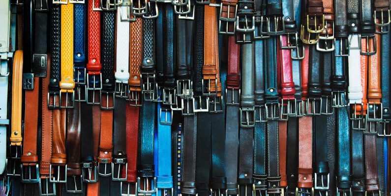 Belts - Shallow Focus Photography of Assorted-color Leather Belts