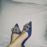 Comfortable Shoes - Woman in High Heels on Bed