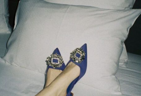 Comfortable Shoes - Woman in High Heels on Bed