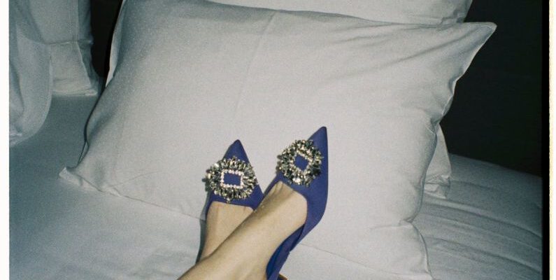 Comfortable Shoes - Woman in High Heels on Bed