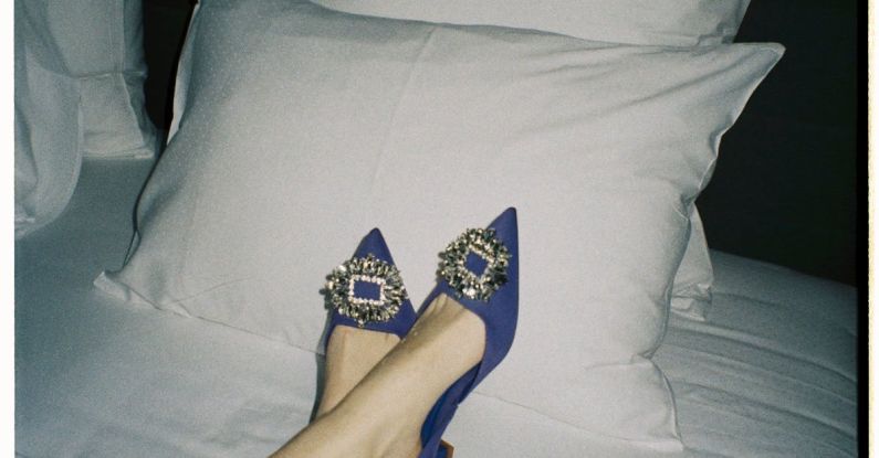 Comfortable Shoes - Woman in High Heels on Bed