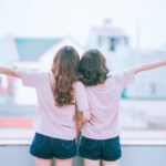 Matching - Two Women on Balcony