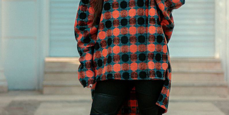 Inserts - Model in a Plaid Sweater and Leggings with Faux Leather Inserts