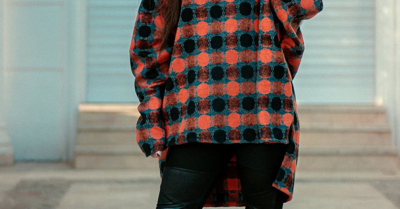 Inserts - Model in a Plaid Sweater and Leggings with Faux Leather Inserts