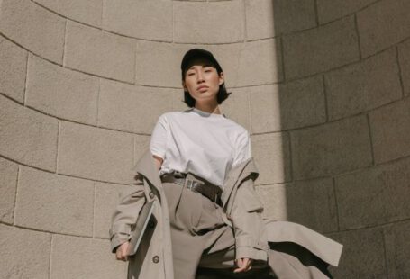 Capsule Wardrobe - Young Woman in a Fashionable Outfit Standing in Sunlight