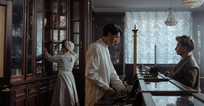 Buying Vintage - Man in White Laboratory Coat Standing in Front of an Elderly Woman