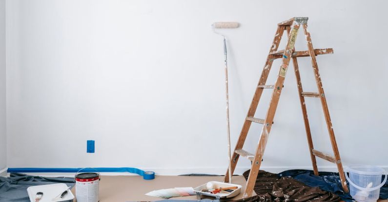 Restoration - Brown Wooden Ladder Beside Painting Materials