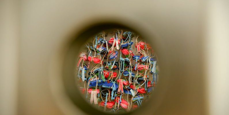 Multi-Purpose Items - Colorful Items seen through a Round Hole in a Surface