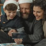 Tech Gifts - A Family Looking at a Photograph