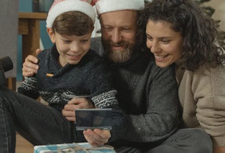 Tech Gifts - A Family Looking at a Photograph