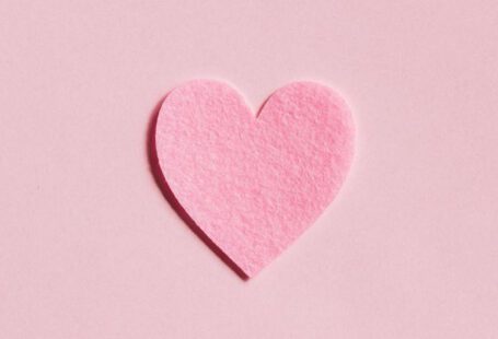 Anniversary Present - Paper Heart on Light Pink Background